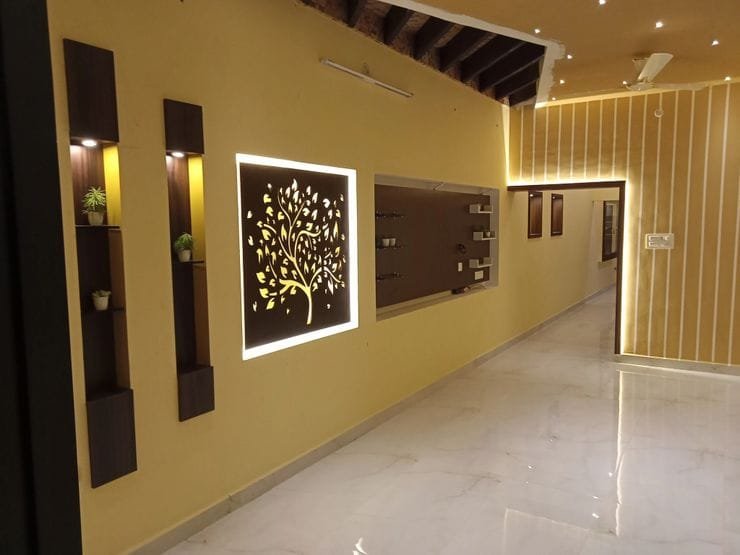 Living room interior with backlit tree CNC jali screen